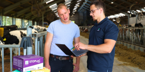 Farmer and AHV Advisor Checking StopLac Data